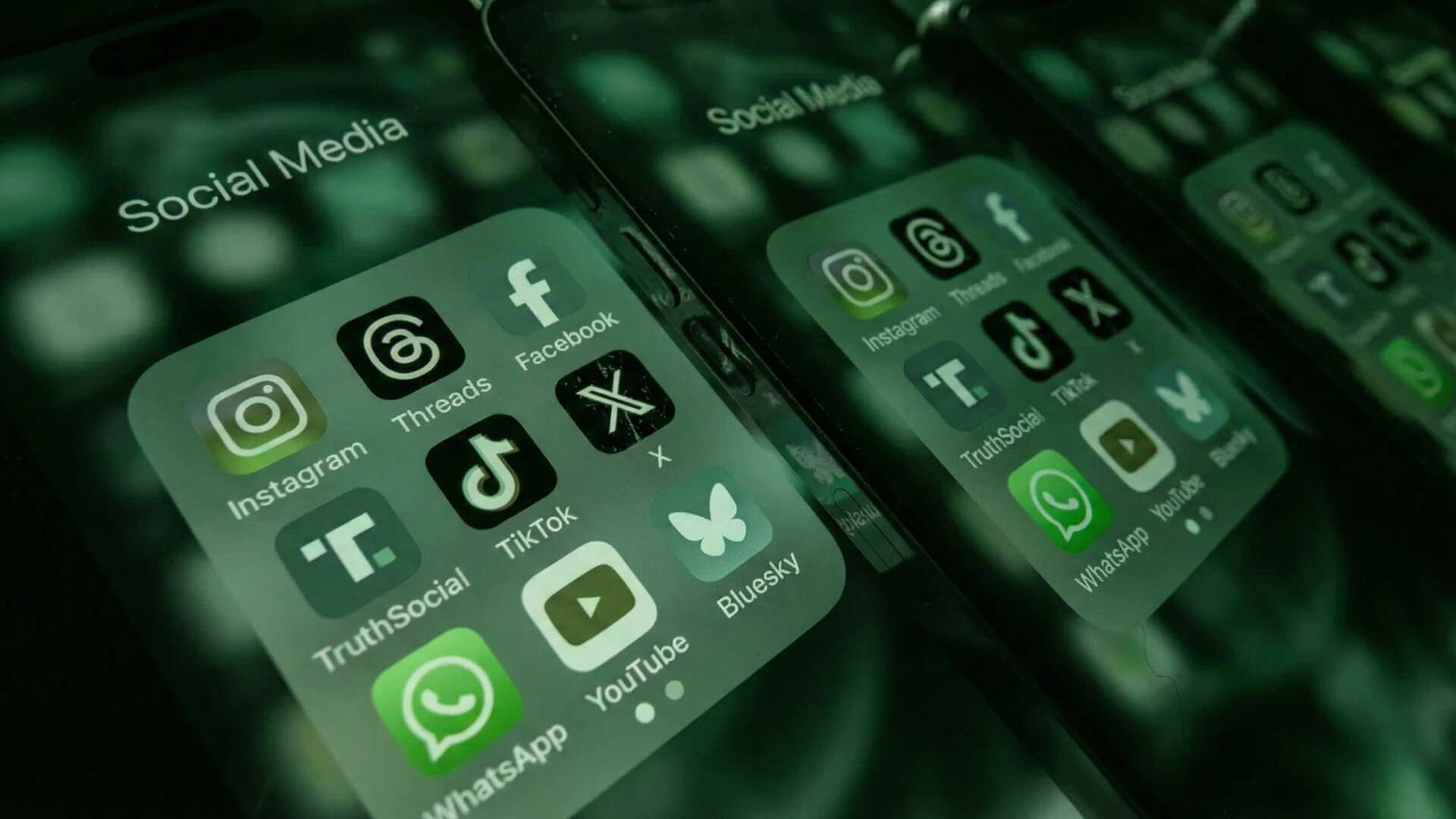 Businessman in a suit interacting with a digital interface, touching a glowing circular button, with financial charts, graphs, and a world map in the background representing global business and data analysis.